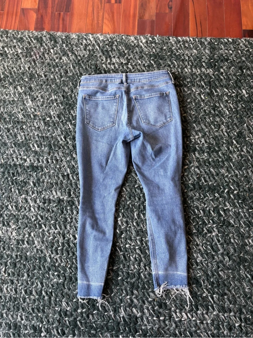 old navy mid rise rockstar super skinny jeans with raw hem